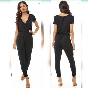 Sold ✔️NWOT Black Wrap Pant Romper